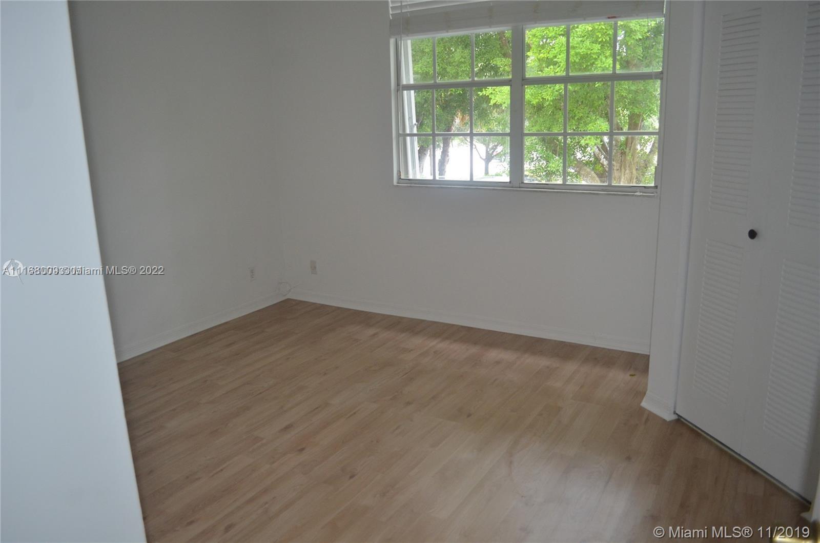 Weston Weston, FL 33326 - Photo 11 of 25 an empty room with a window
