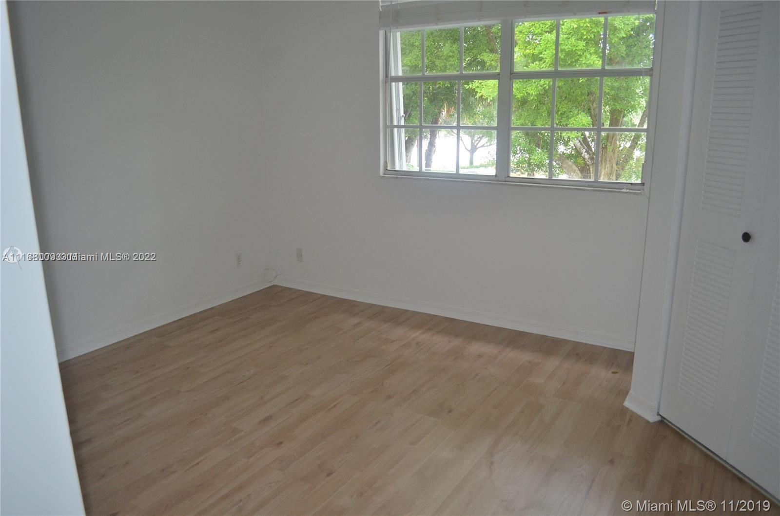 Weston Weston, FL 33326 - Photo 12 of 25 an empty room with a window