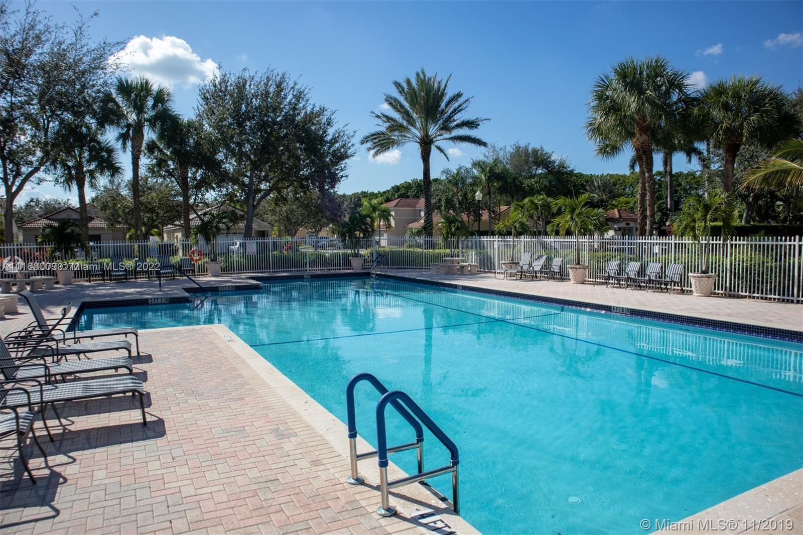 Weston Weston, FL 33326 - Photo 19 of 25 a view of a lake with a outdoor space