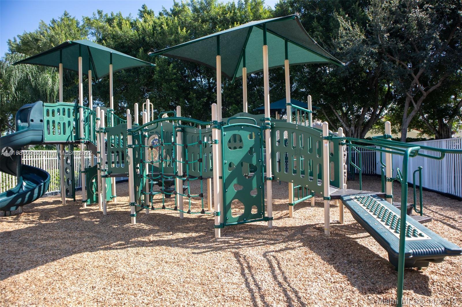Weston Weston, FL 33326 - Photo 20 of 25 a view of a house with backyard and sitting area