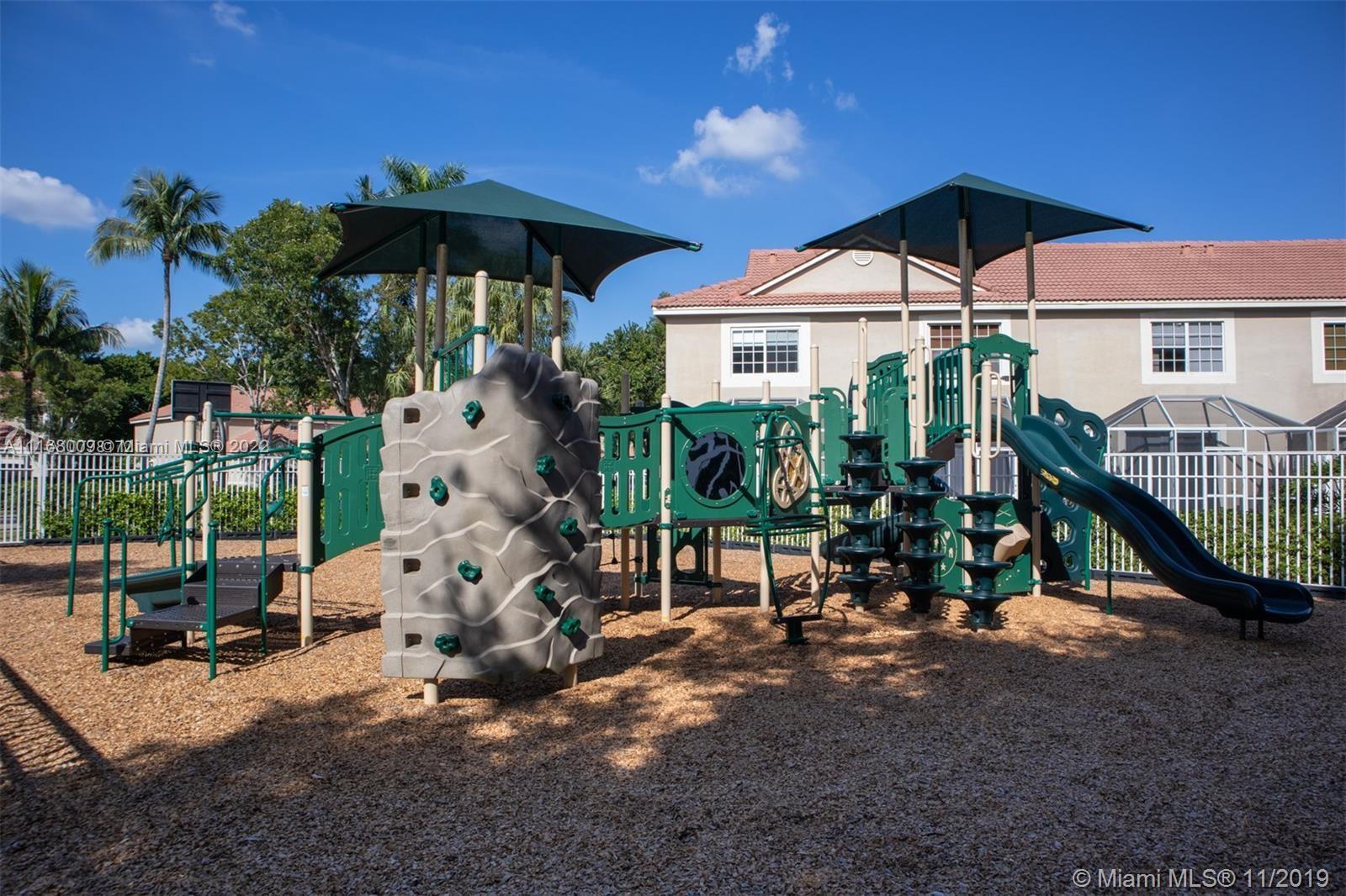 Weston Weston, FL 33326 - Photo 21 of 25 a view of a house with a yard