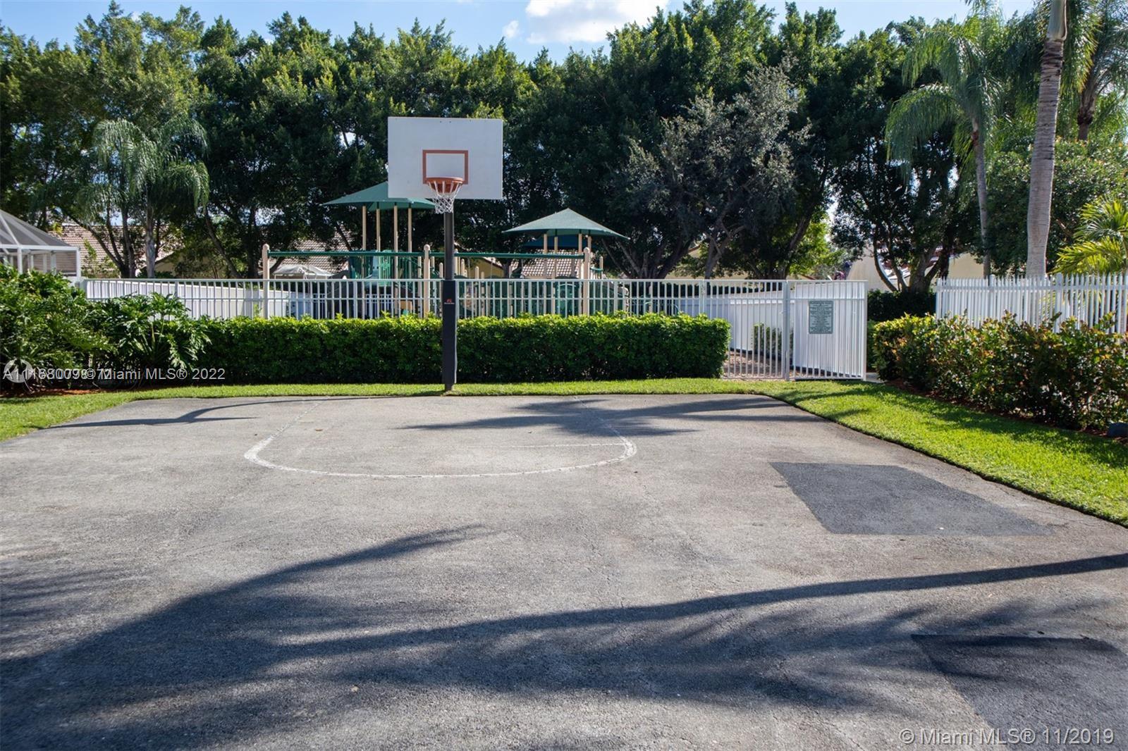 Weston Weston, FL 33326 - Photo 23 of 25 a sign that is sitting on the side of a road