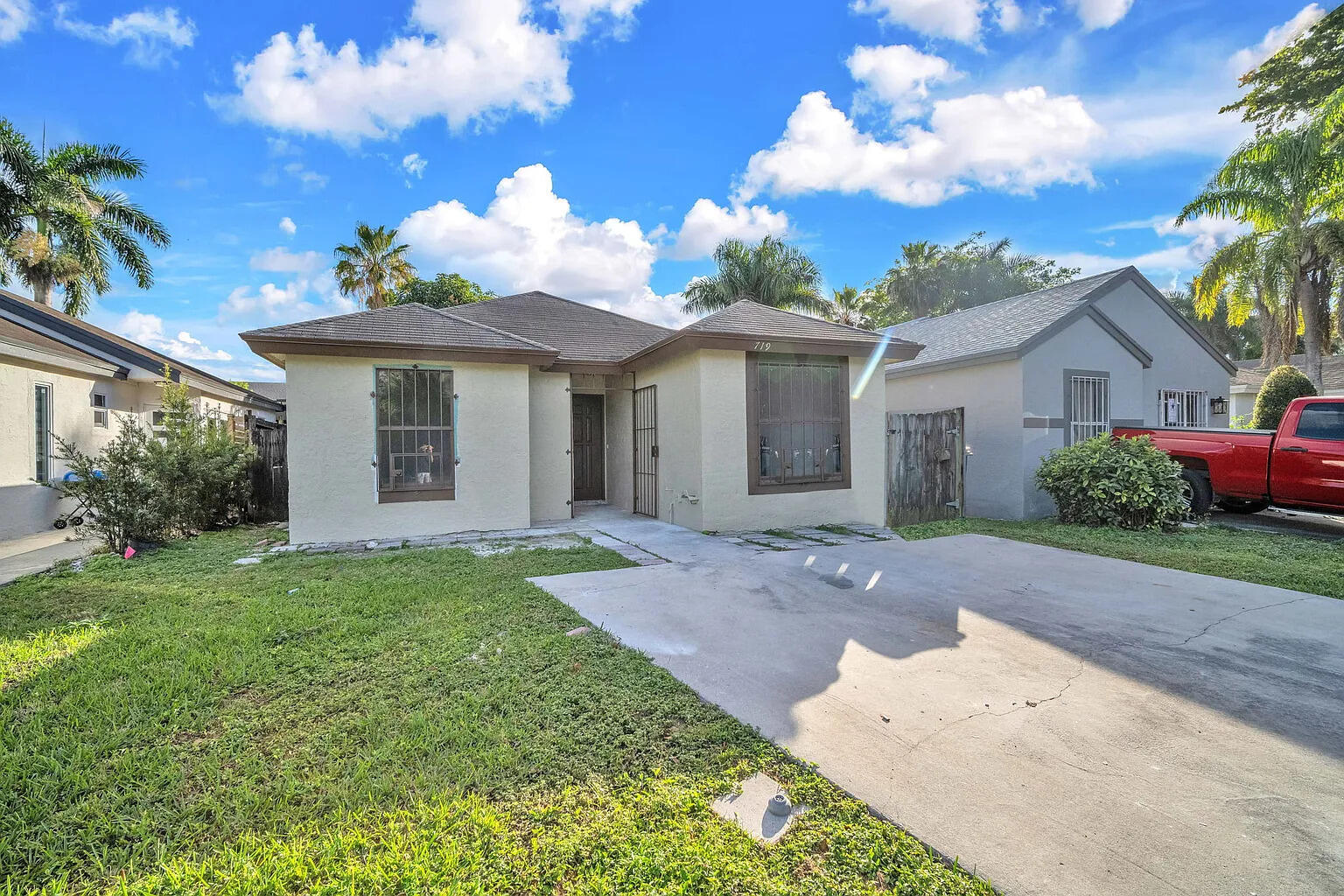 719 Southwest 10th Street Florida City, FL 33034 - Photo 13 of 13 a view of a house with a yard