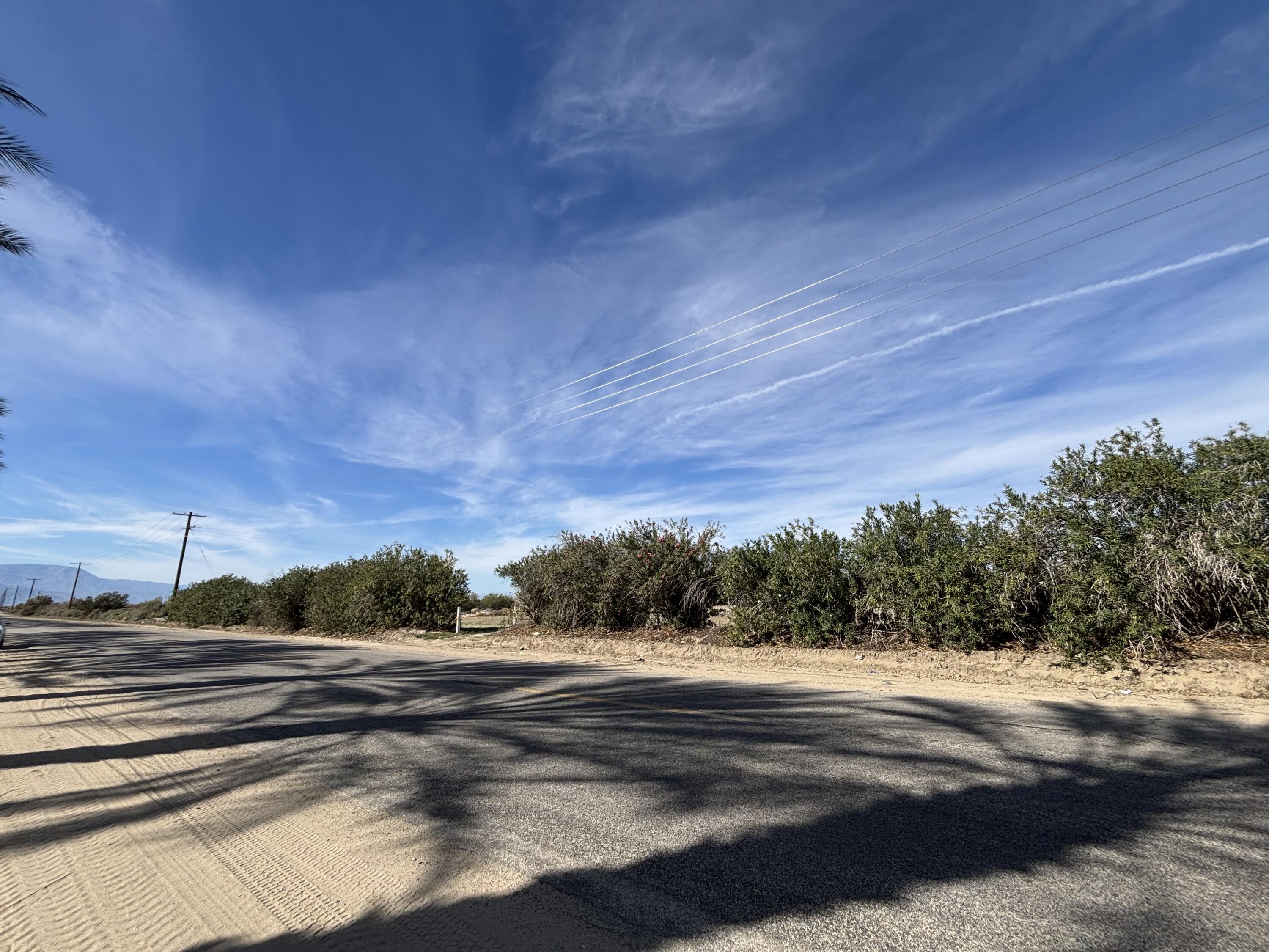 0 70th Avenue Mecca, CA 92254 - Photo 3 of 3 a view of a road with a yard