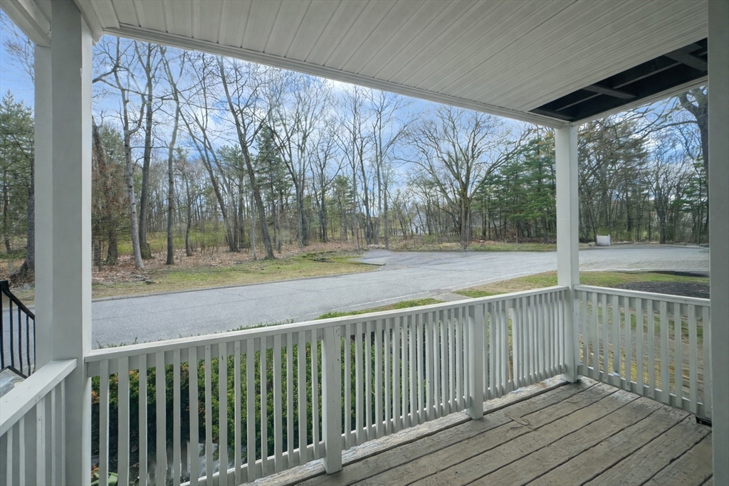 30 Abbey Road, Unit 108 Leominster, MA 01453 - Photo 13 of 21 a view of a wooden deck with a yard