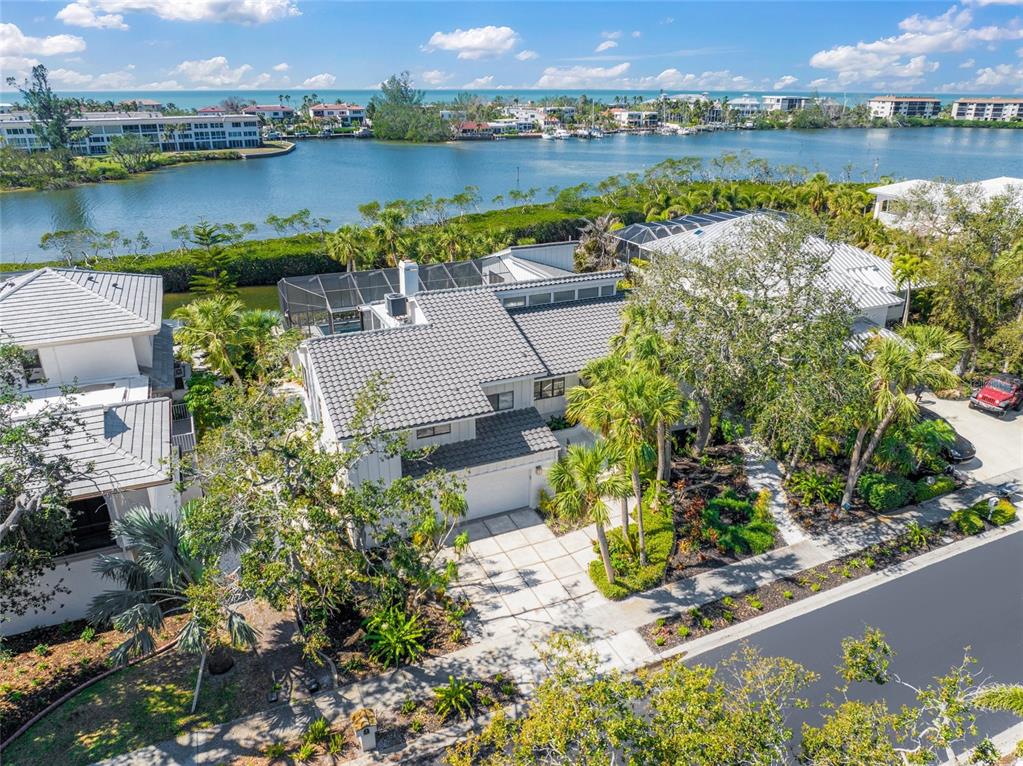 3421 Bayou Sound Longboat Key, FL 34228 - Photo 4 of 79 an aerial view of a house with a lake view