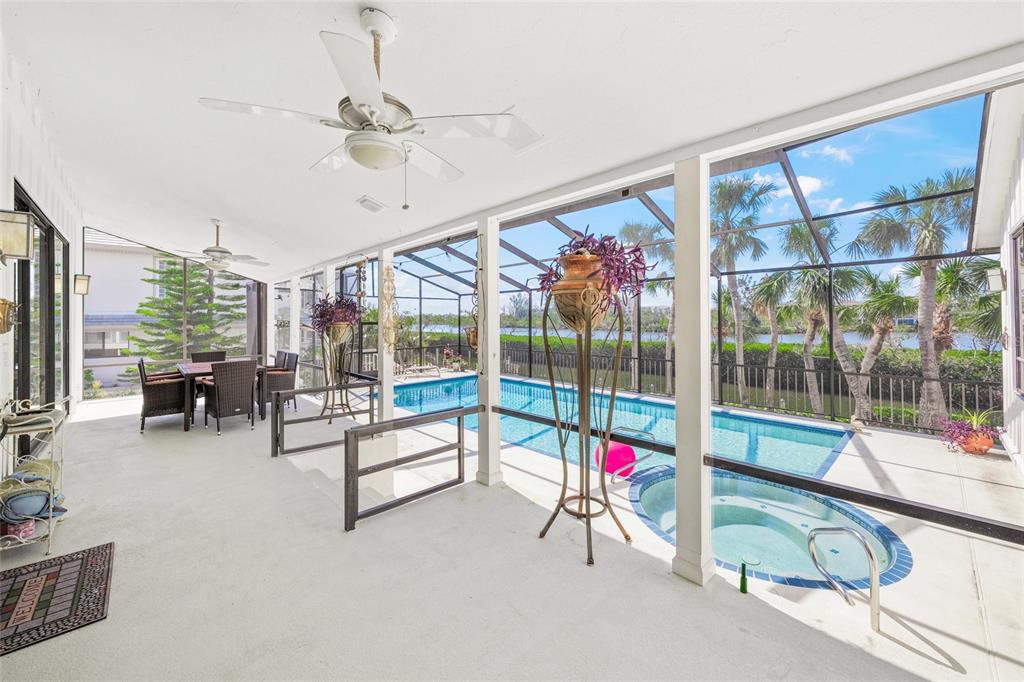 3421 Bayou Sound Longboat Key, FL 34228 - Photo 50 of 79 a view of a living room and balcony