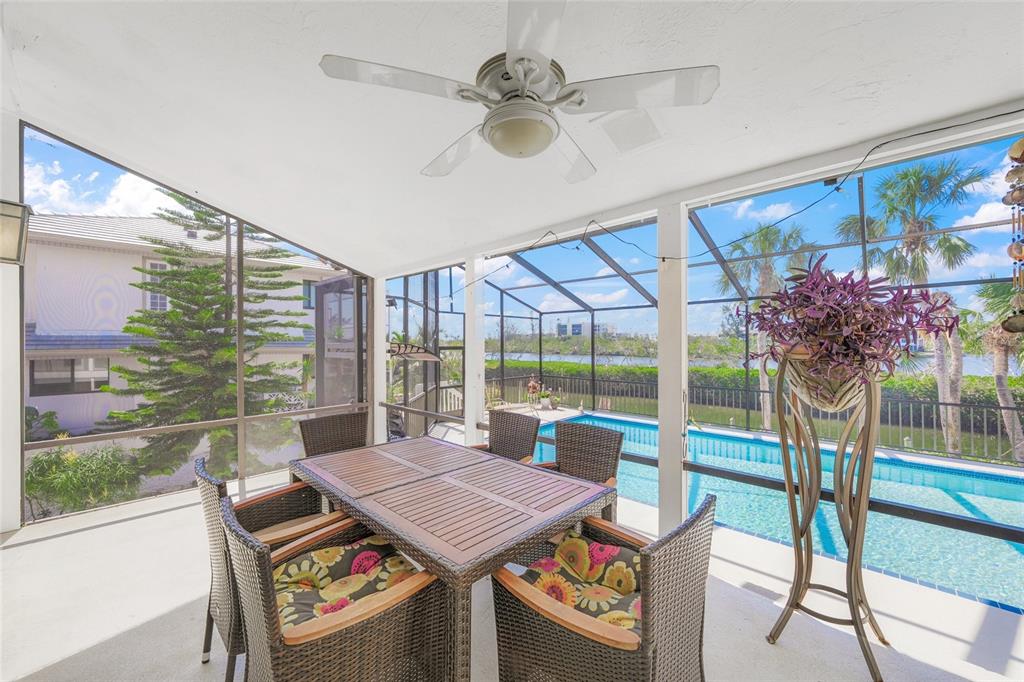 3421 Bayou Sound Longboat Key, FL 34228 - Photo 52 of 79 a view of a dining room with furniture window and outside view