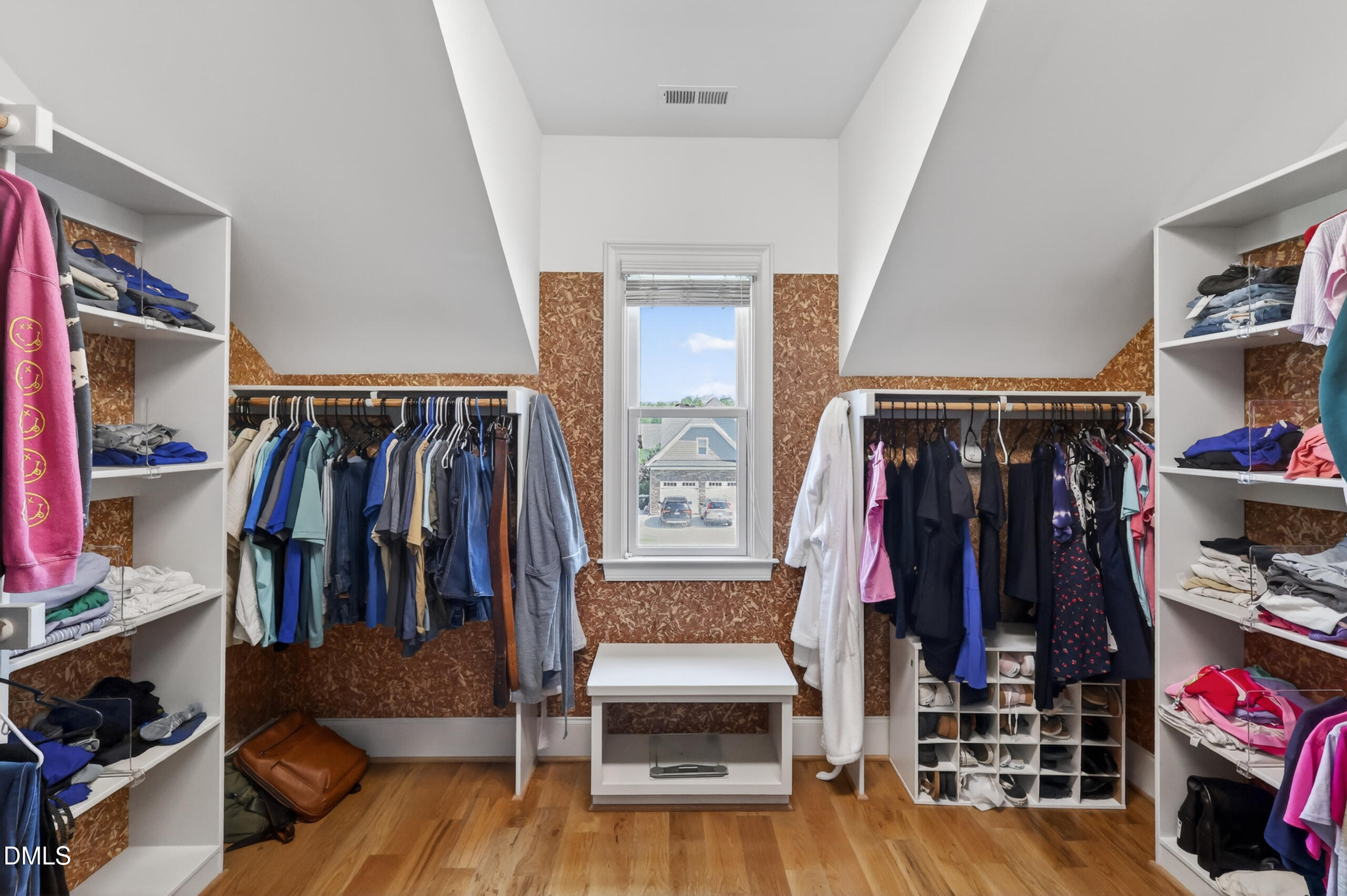 261 Character Drive Rolesville, NC 27571 - Photo 40 of 77 a view of walk in closet with clothes and shoes