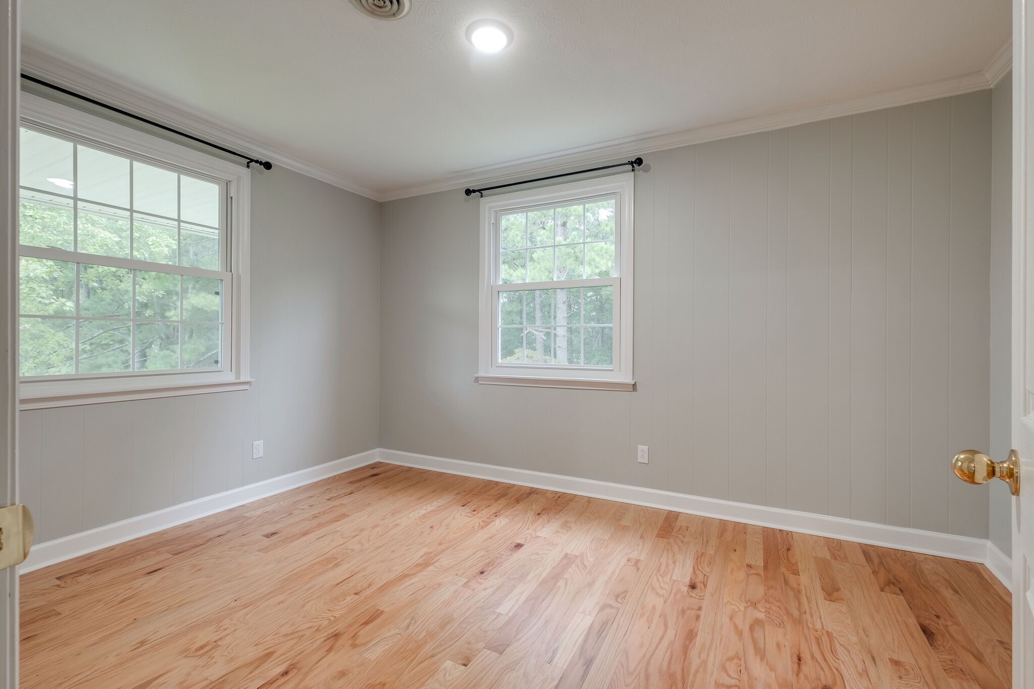 8860 Lyles Road Lyles, TN 37098 - Photo 18 of 36 a view of a room with wooden floor and windows