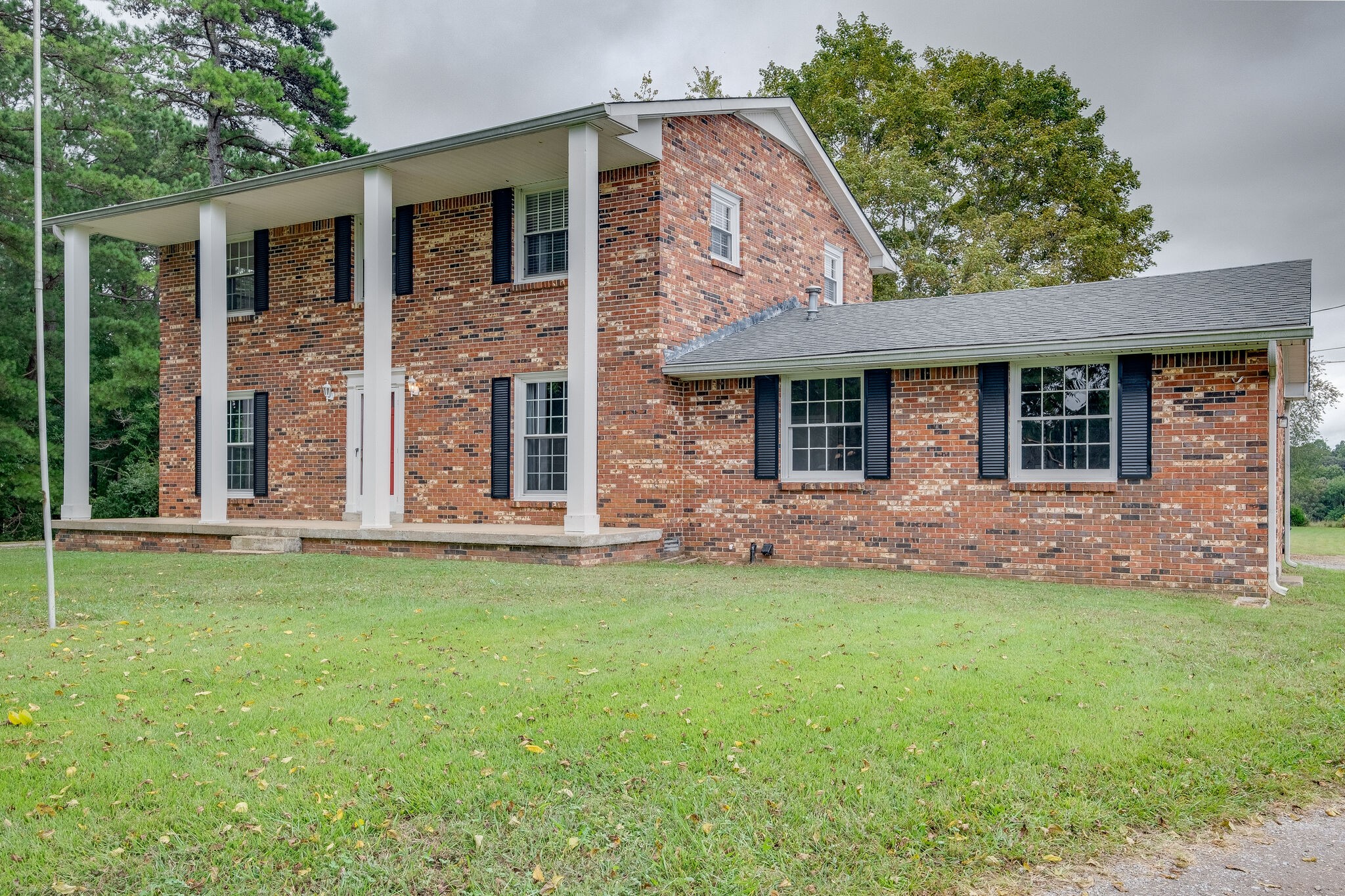 8860 Lyles Road Lyles, TN 37098 - Photo 2 of 36 front view of a house with a yard