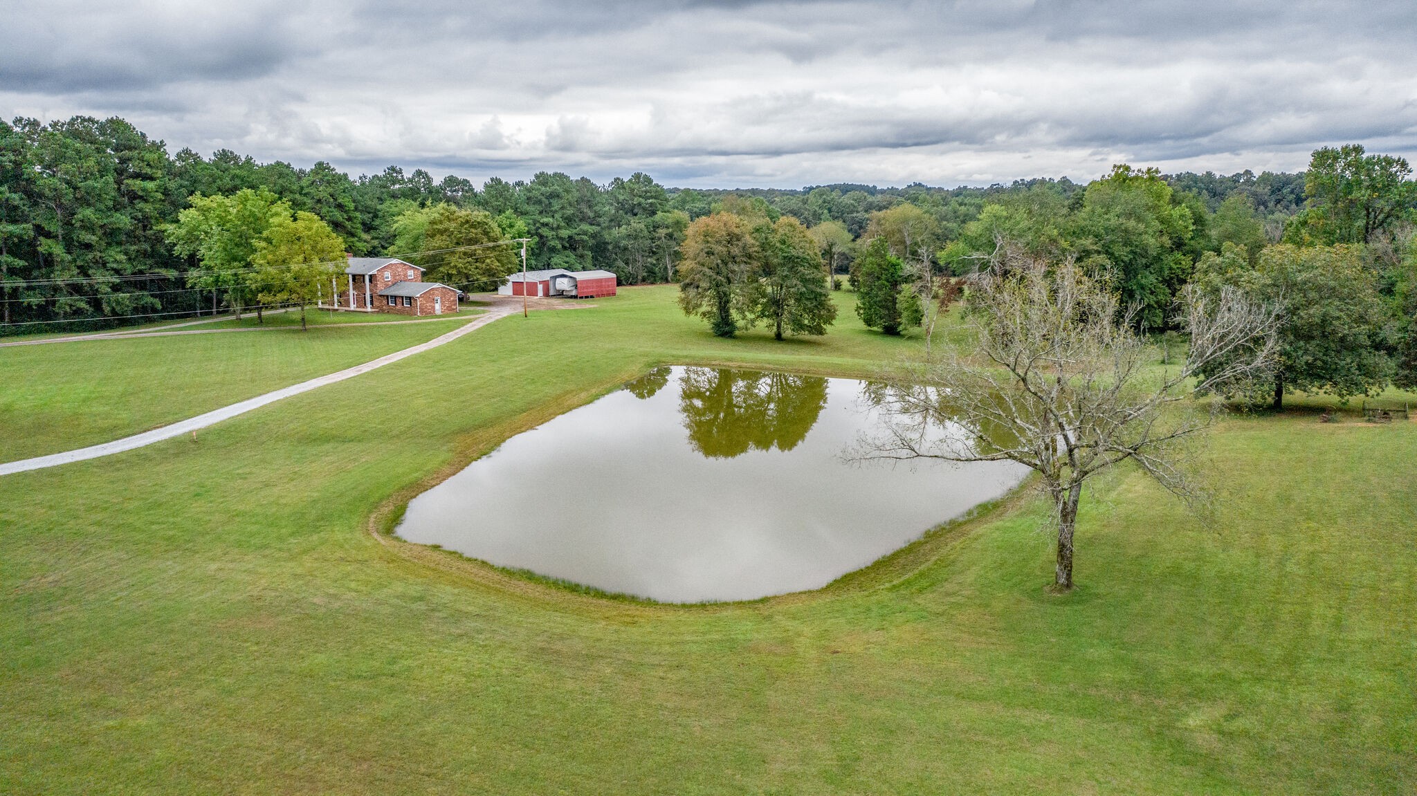 8860 Lyles Road Lyles, TN 37098 - Photo 31 of 36 a view of a lake in a backyard