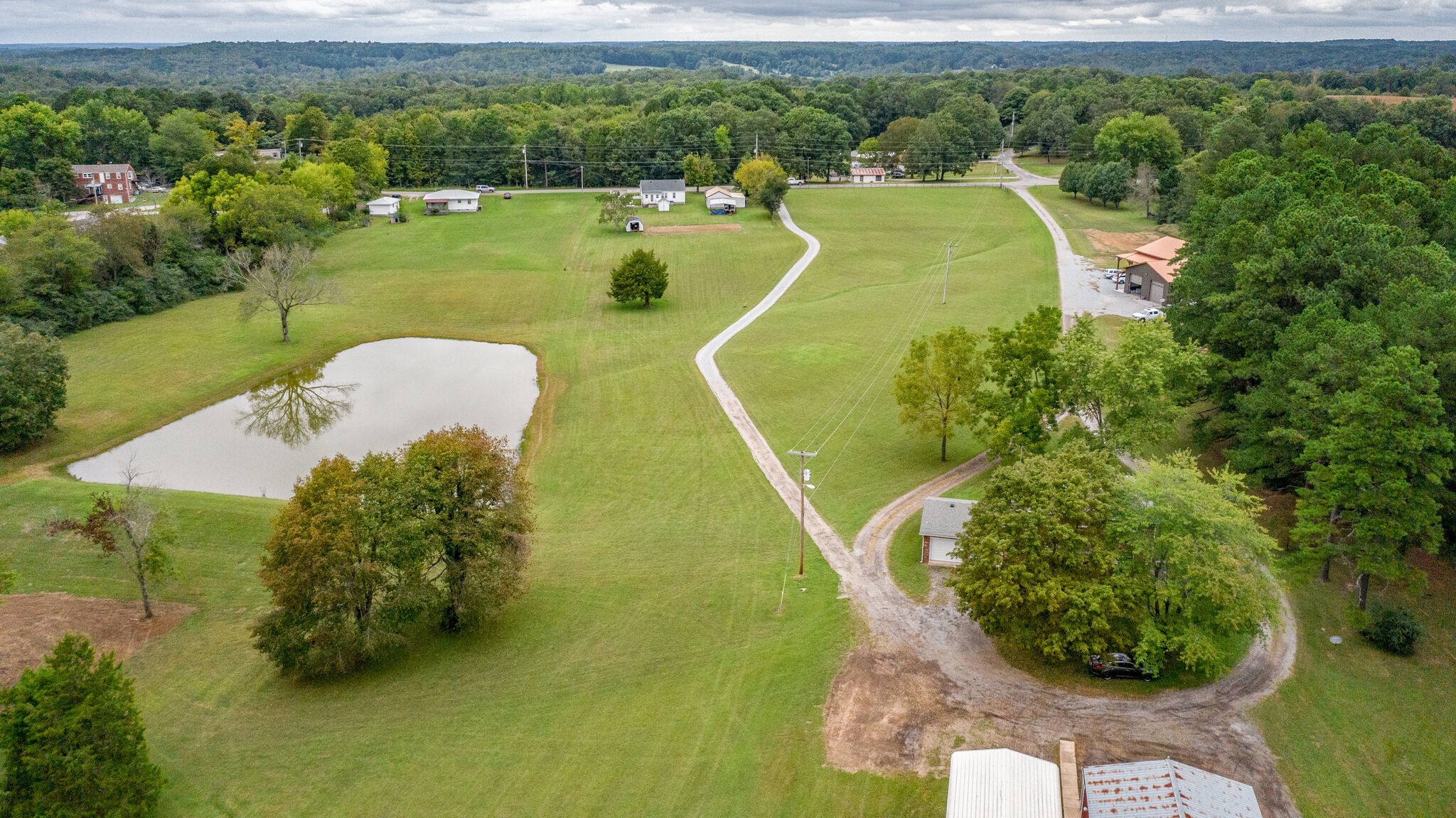 8860 Lyles Road Lyles, TN 37098 - Photo 32 of 36 a view of a swimming pool with a yard