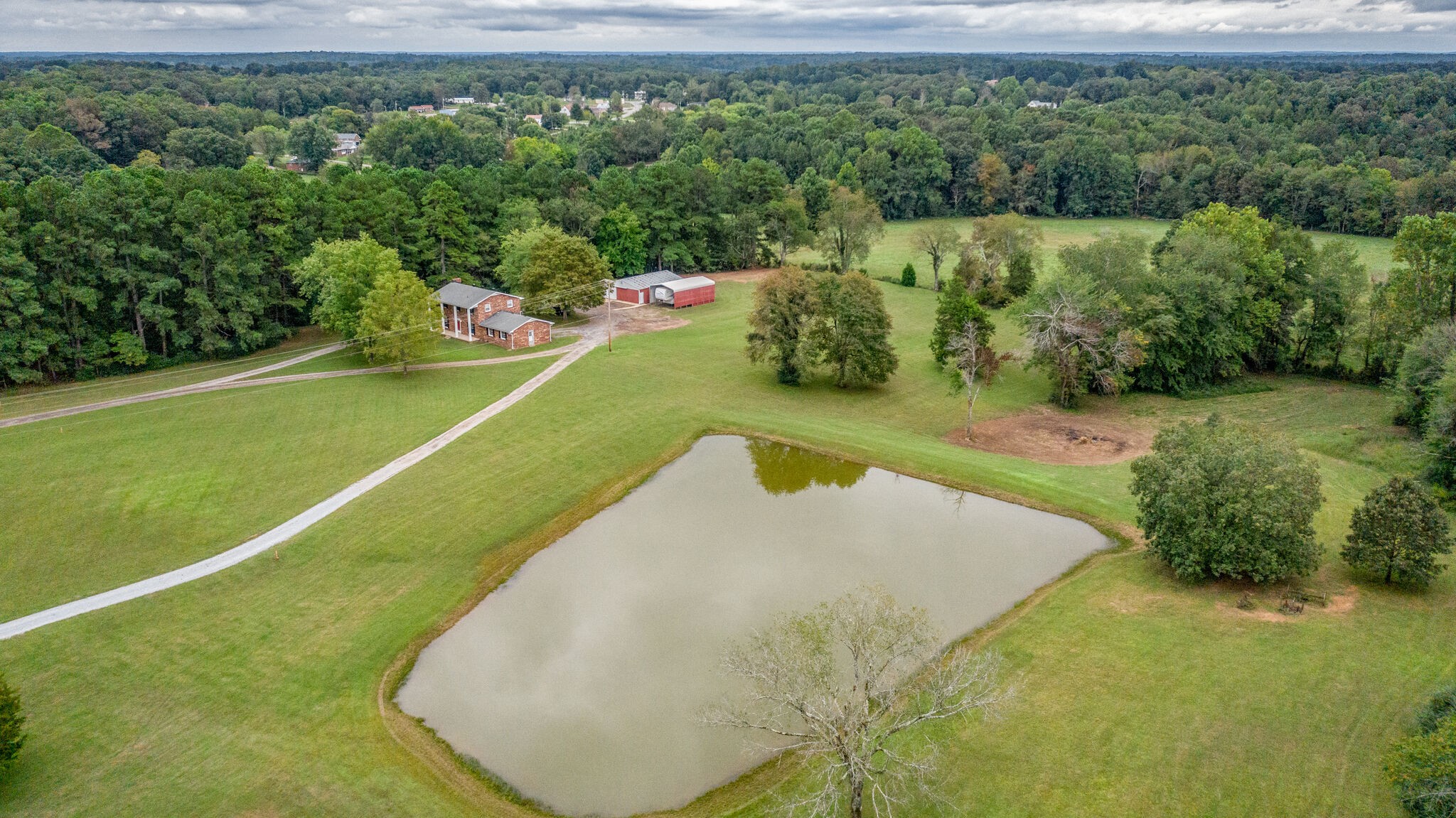 8860 Lyles Road Lyles, TN 37098 - Photo 36 of 36 a view of a lake with a yard