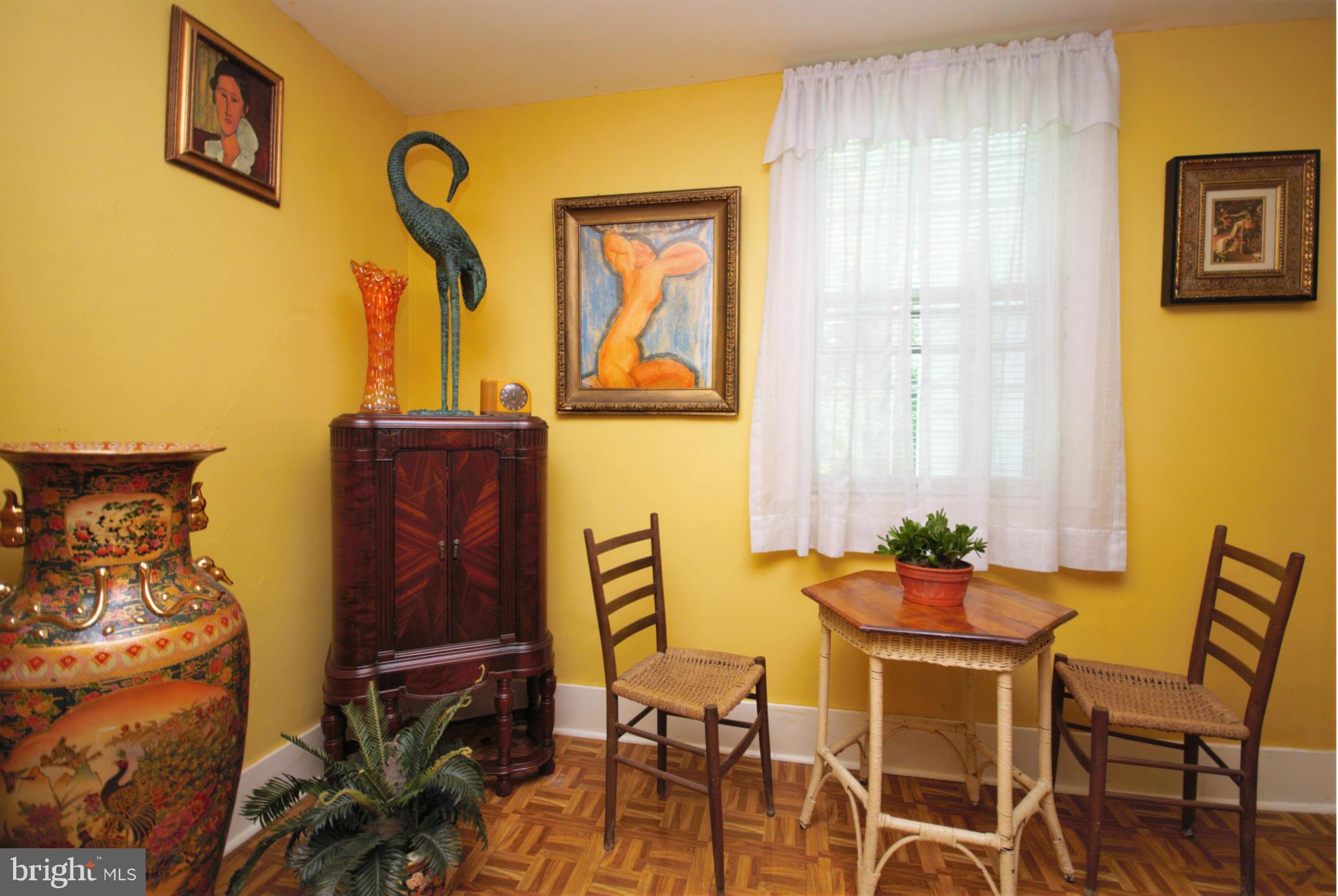 6109 Falls Road Baltimore, MD 21209 - Photo 6 of 26 a dining room with furniture and a window