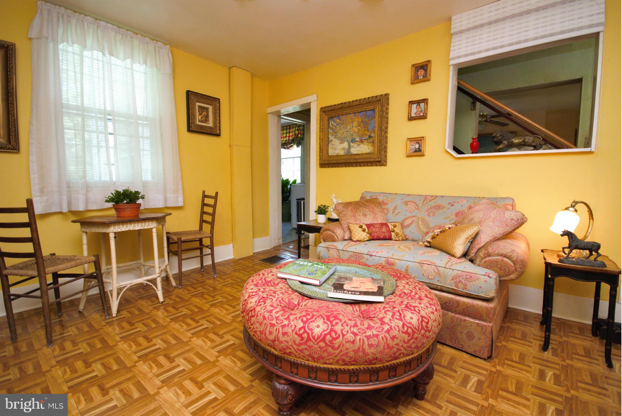 6109 Falls Road Baltimore, MD 21209 - Photo 10 of 26 a living room with furniture and a potted plant