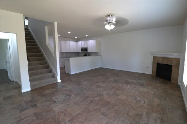 a kitchen with granite countertop stainless steel appliances and sink