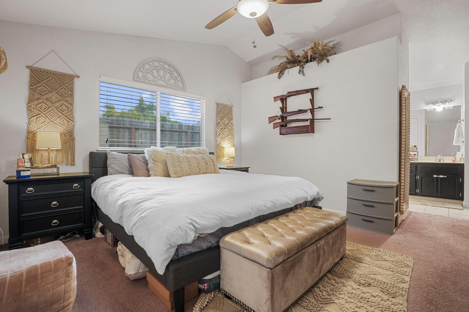 1017 Jayhawk Way Modesto, CA 95358 - Photo 13 of 32 a bedroom with a bed and window