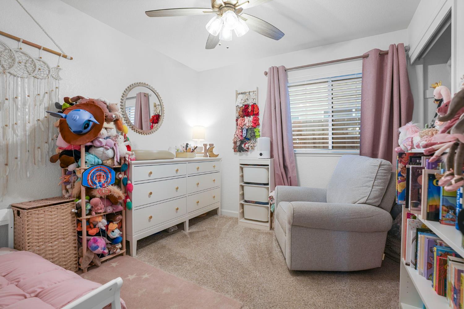 1017 Jayhawk Way Modesto, CA 95358 - Photo 17 of 32 a bedroom with furniture and a window