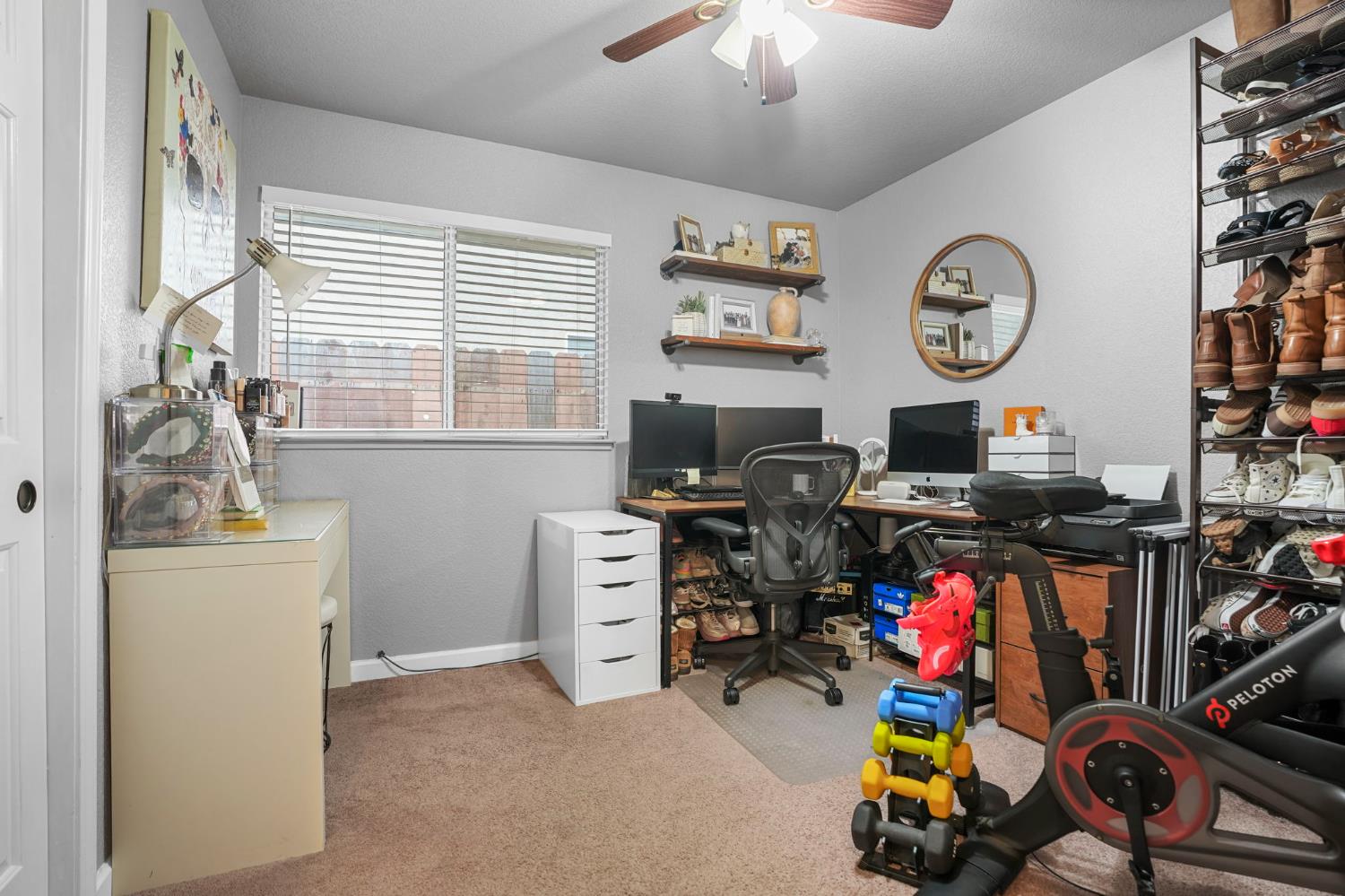 1017 Jayhawk Way Modesto, CA 95358 - Photo 20 of 32 a view of a workspace with furniture and a window