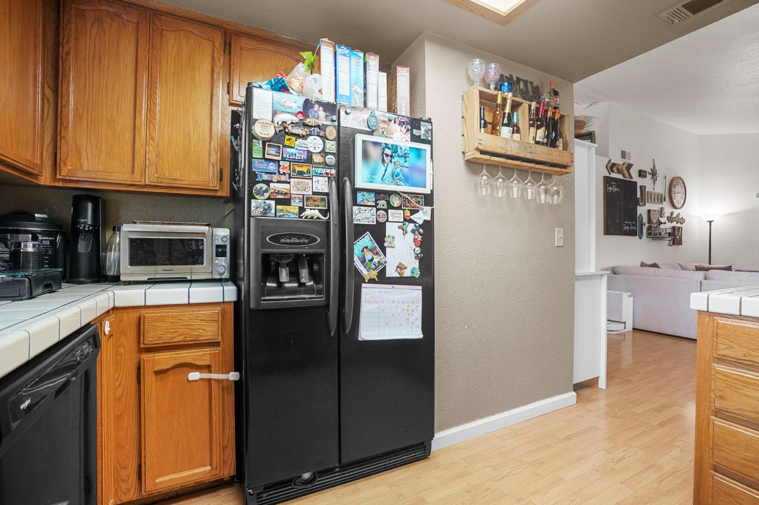 1017 Jayhawk Way Modesto, CA 95358 - Photo 10 of 32 a kitchen with stainless steel appliances granite countertop a refrigerator and a stove top oven