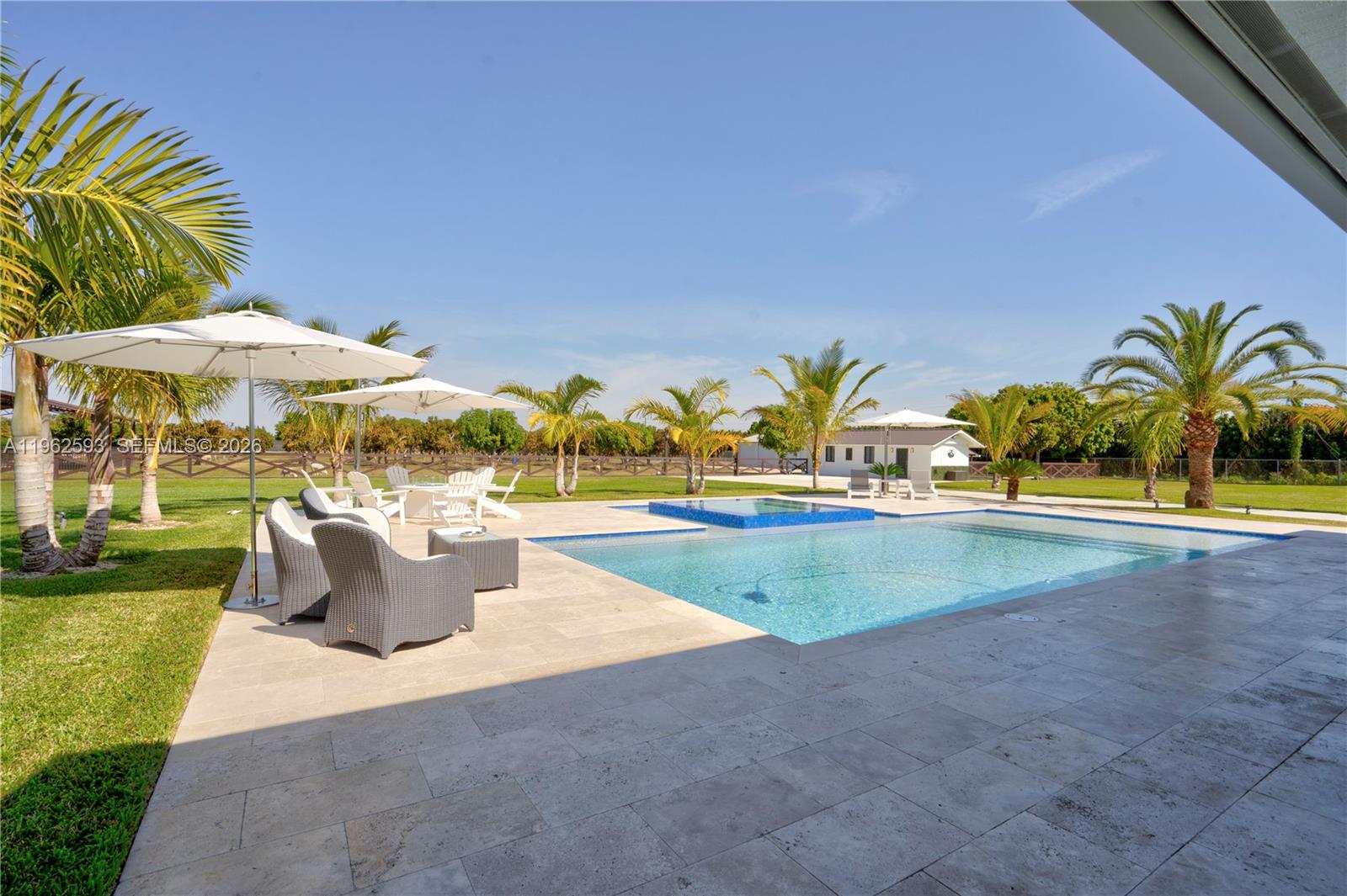 20407 Southwest 226th Street Miami, FL 33170 - Photo 2 of 2 a view of outdoor space yard and swimming pool