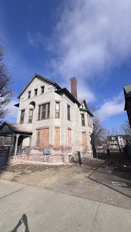 2345 Main Street Springfield, MA 01107 - Photo 3 of 13 a front view of a building with streets and trees