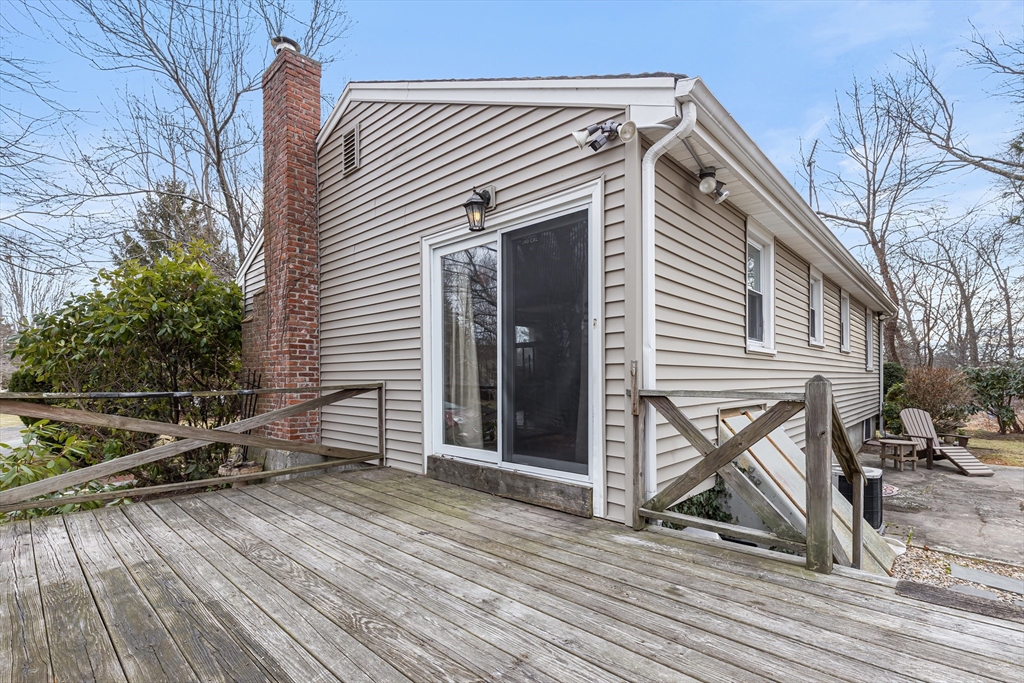 90 Washington Terrace Whitman, MA 02382 - Photo 15 of 18 a view of a house with a wooden deck