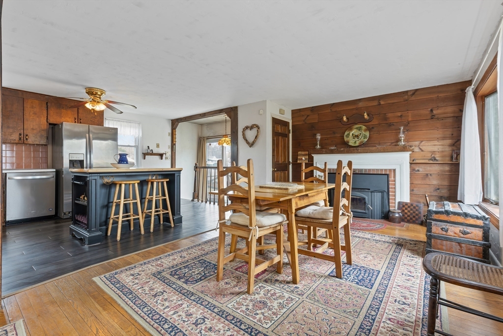 90 Washington Terrace Whitman, MA 02382 - Photo 5 of 18 a dining room with furniture a rug and wooden floor