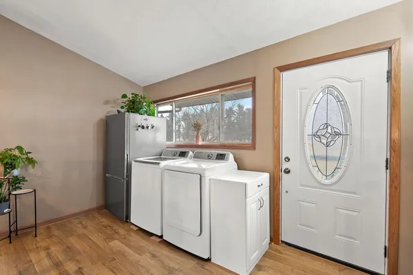 a utility room with dryer and washer