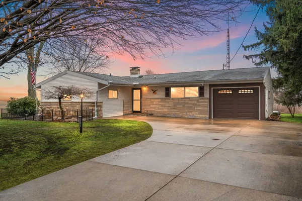a house view with a backyard space