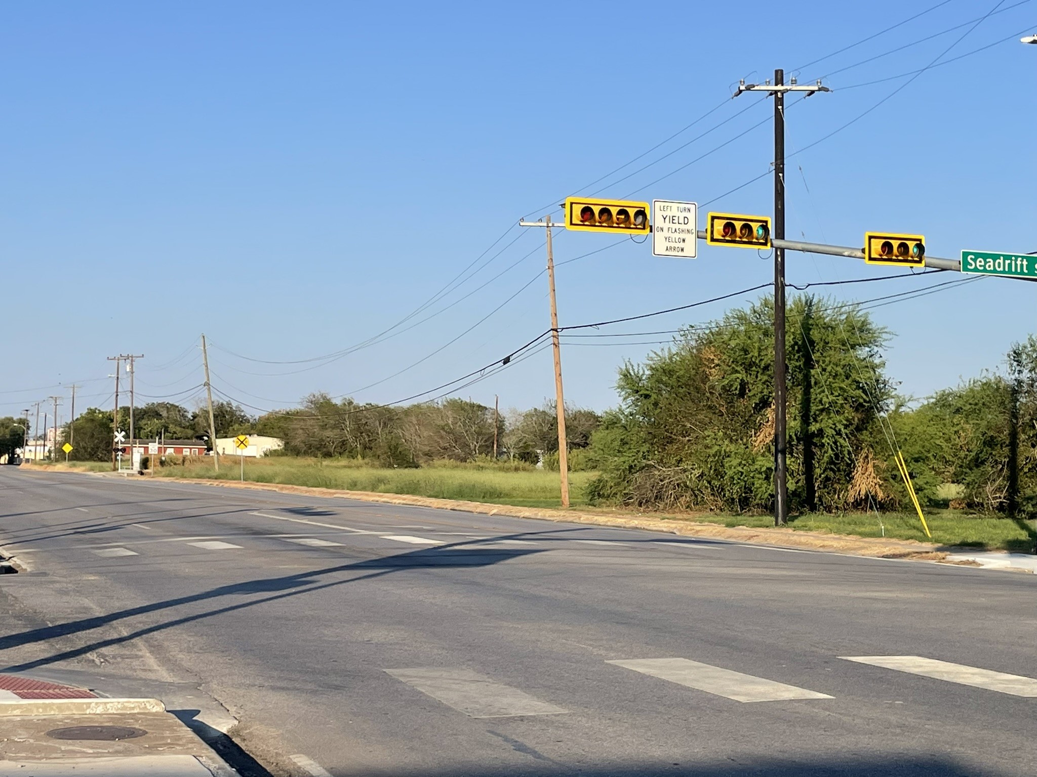 238 Seadrift Street Port Lavaca, TX 77979 - Photo 4 of 11 a street with a traffic light on it