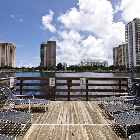 a patio with a patio table and chairs under an umbrella
