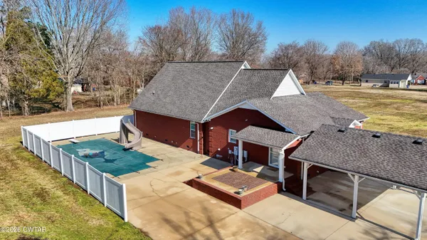 a view of a terrace with trees