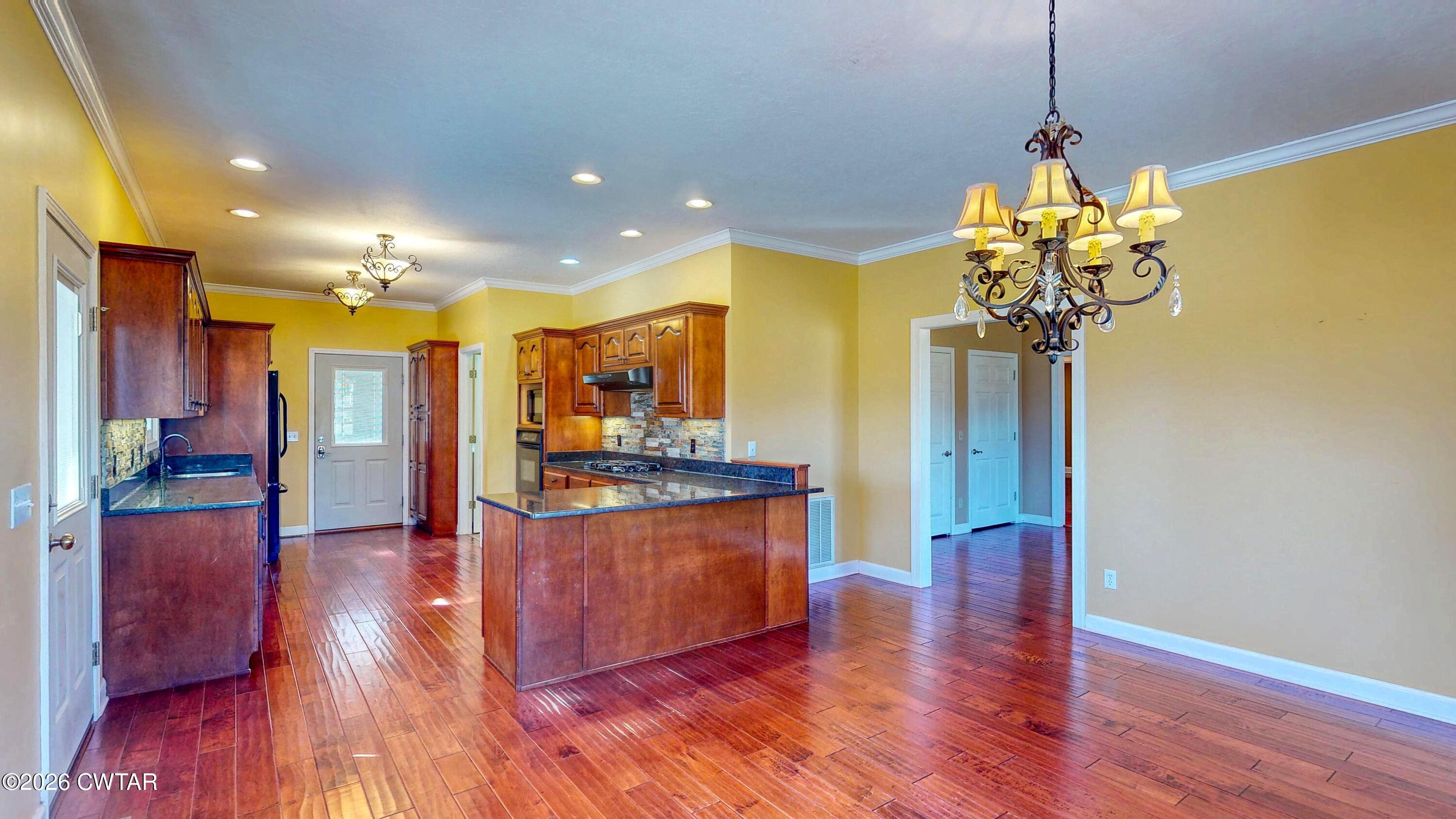 101 Oak Lane Gleason, TN 38229 - Photo 14 of 50 a view of a living room and kitchen