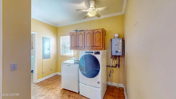 a utility room with dryer and washer