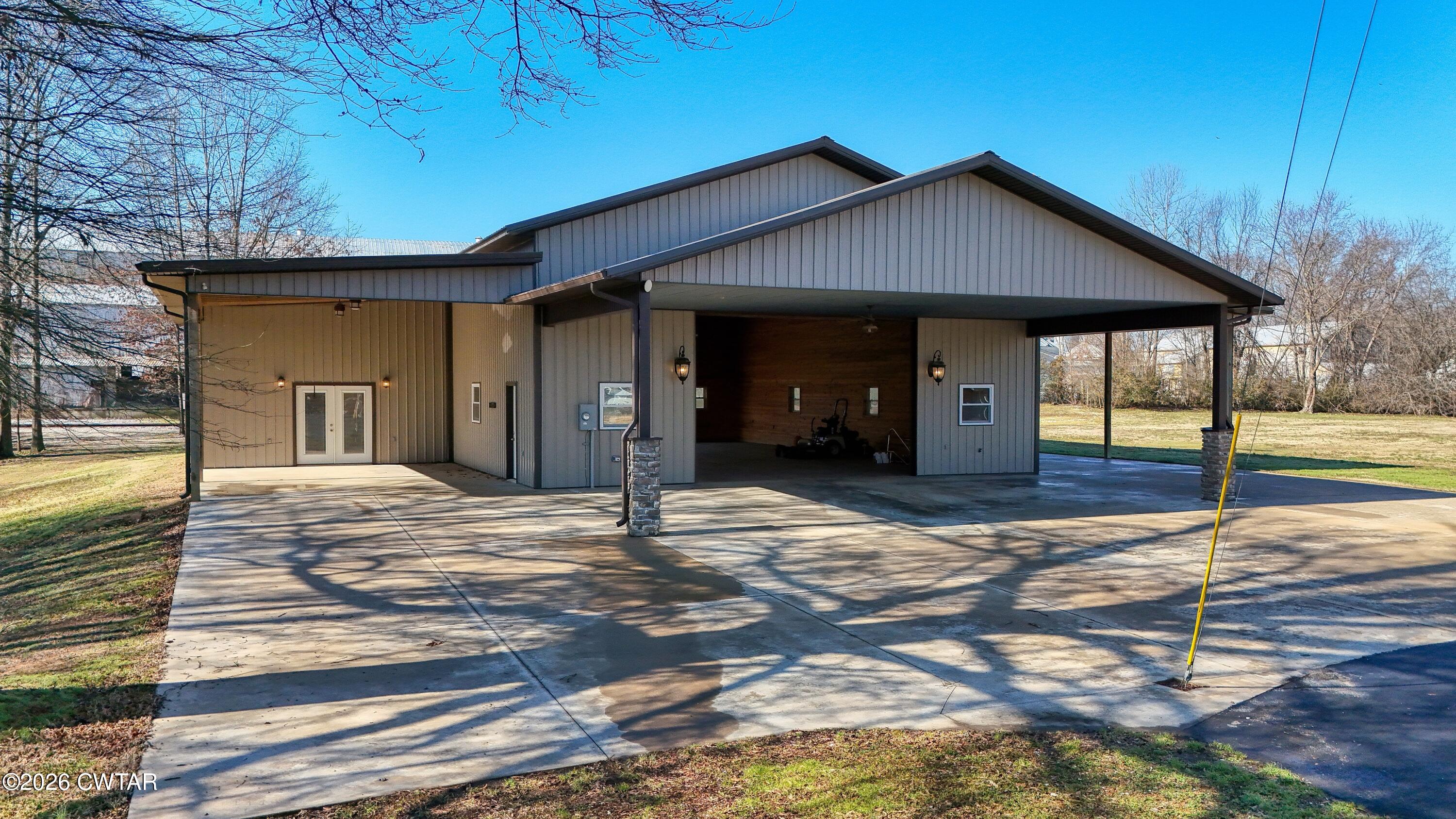 101 Oak Lane Gleason, TN 38229 - Photo 37 of 50 a view of a house with wooden floor and fence