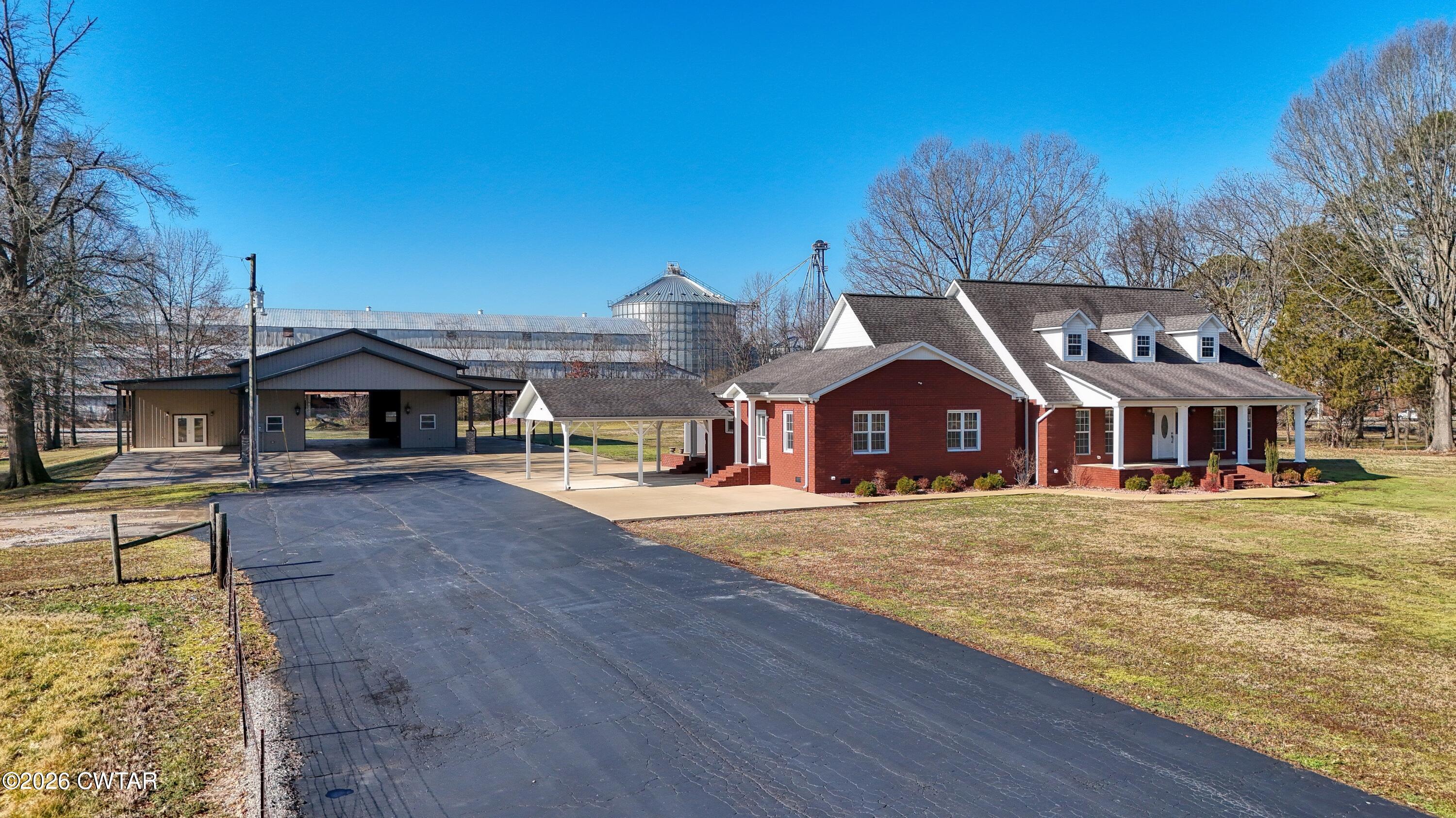 101 Oak Lane Gleason, TN 38229 - Photo 5 of 50 a front view of a house with a yard