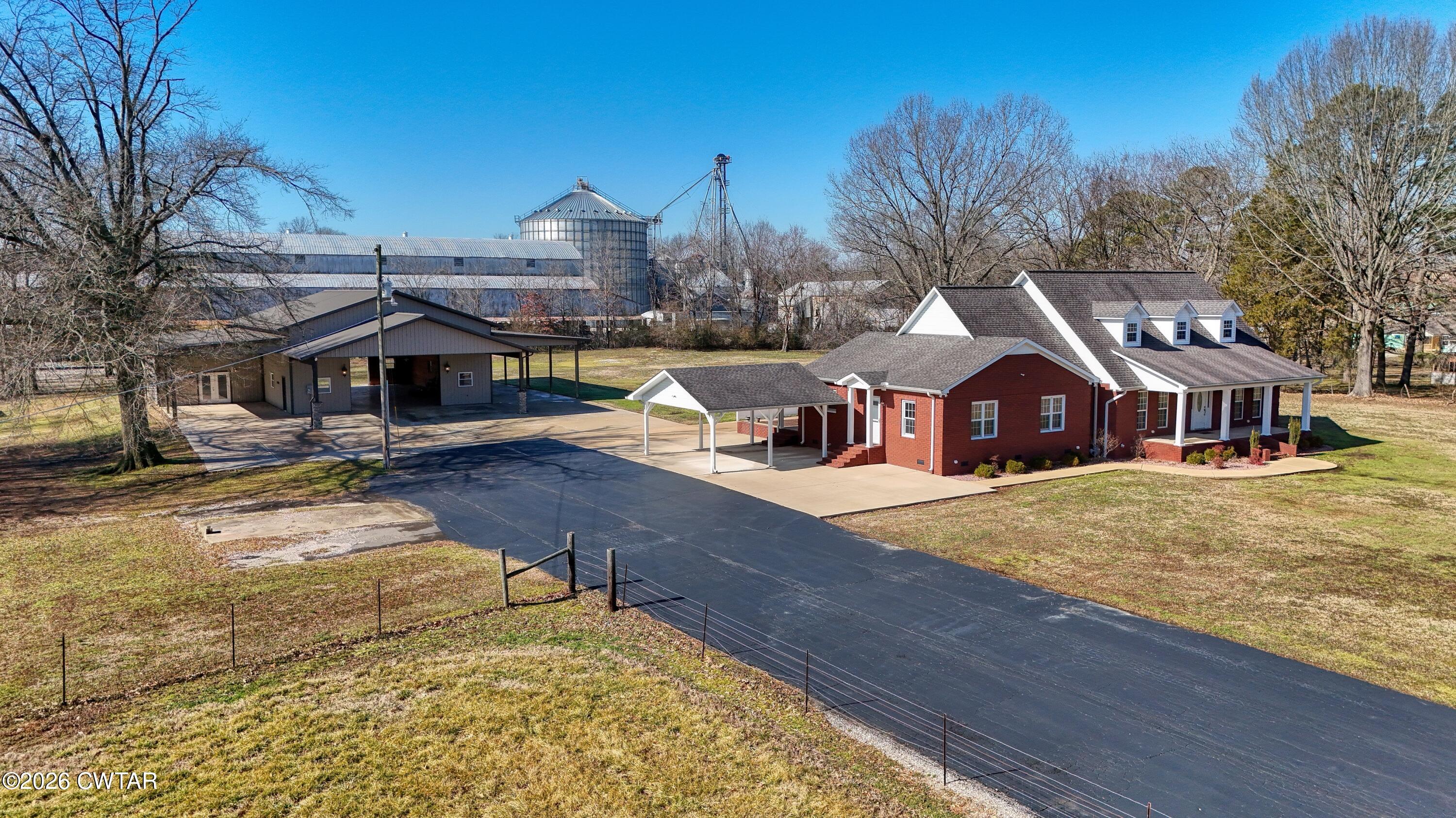 101 Oak Lane Gleason, TN 38229 - Photo 7 of 50 a front view of a house with a yard
