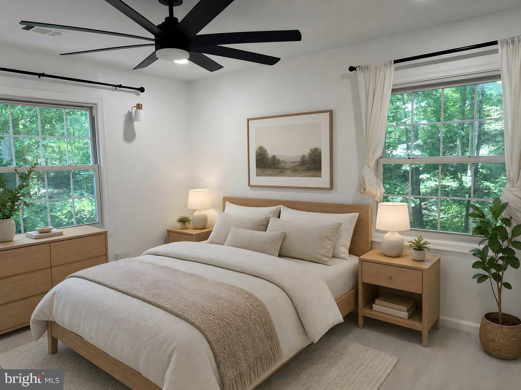 5900 Prince George Drive, Unit 333 Springfield, VA 22152 - Photo 17 of 31 a bedroom with a bed and a large window