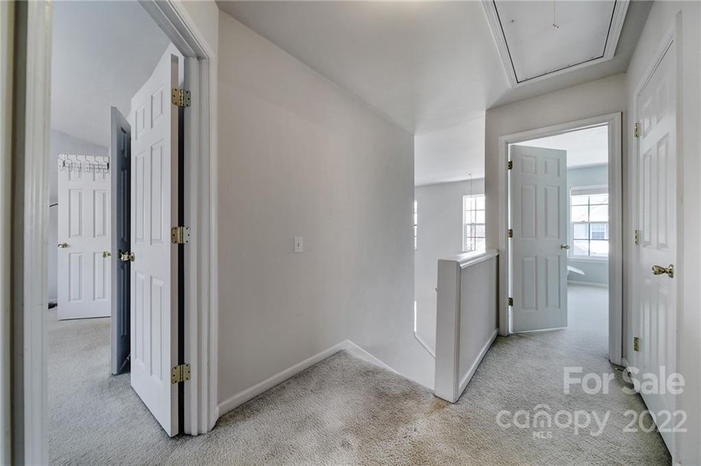 11428 Grove Point Road Charlotte, NC 28277 - Photo 16 of 36 an empty room with windows