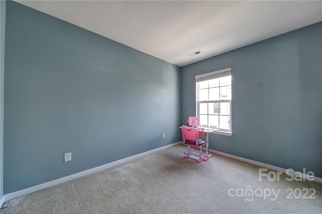 11428 Grove Point Road Charlotte, NC 28277 - Photo 25 of 36 a room with furniture and window