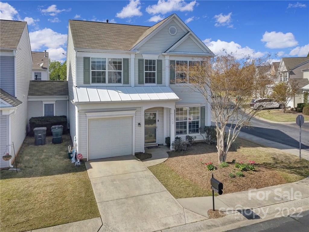 11428 Grove Point Road Charlotte, NC 28277 - Photo 30 of 36 a front view of a house with garden