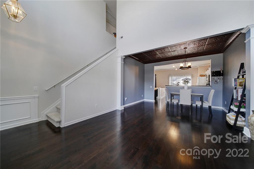 11428 Grove Point Road Charlotte, NC 28277 - Photo 4 of 36 a view of dining room with wooden floor