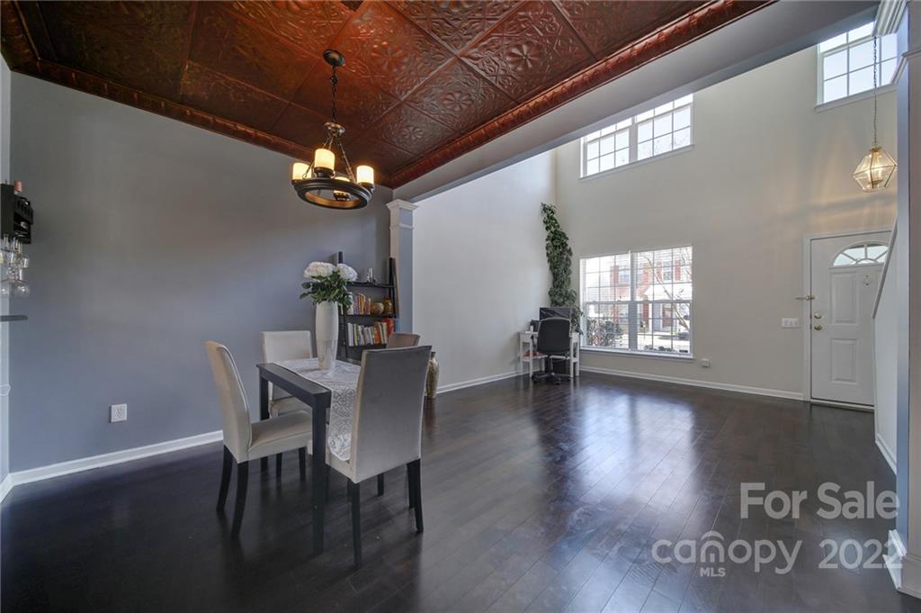 11428 Grove Point Road Charlotte, NC 28277 - Photo 6 of 36 a view of a livingroom with furniture window and wooden floor