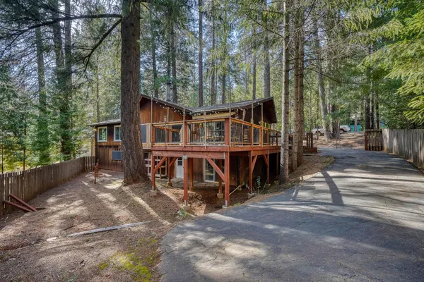 a view of balcony with furniture