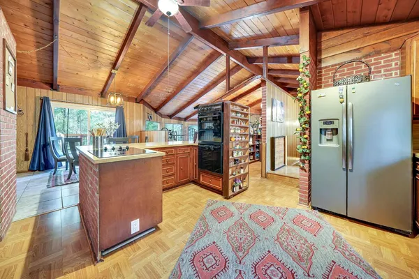 a room with gym equipment and a large window