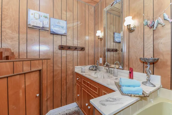 a spacious bedroom with a bed and a table