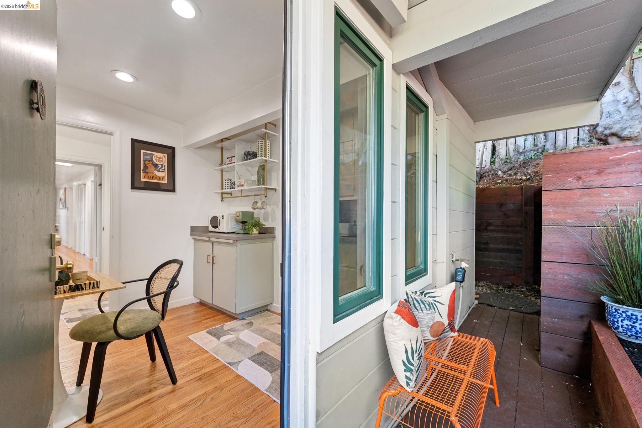 2301 Oak Street Berkeley, CA 94708 - Photo 29 of 61 Compact interior space featuring wood-finish flooring, recessed lighting, and a built-in cabinetry unit with shelving