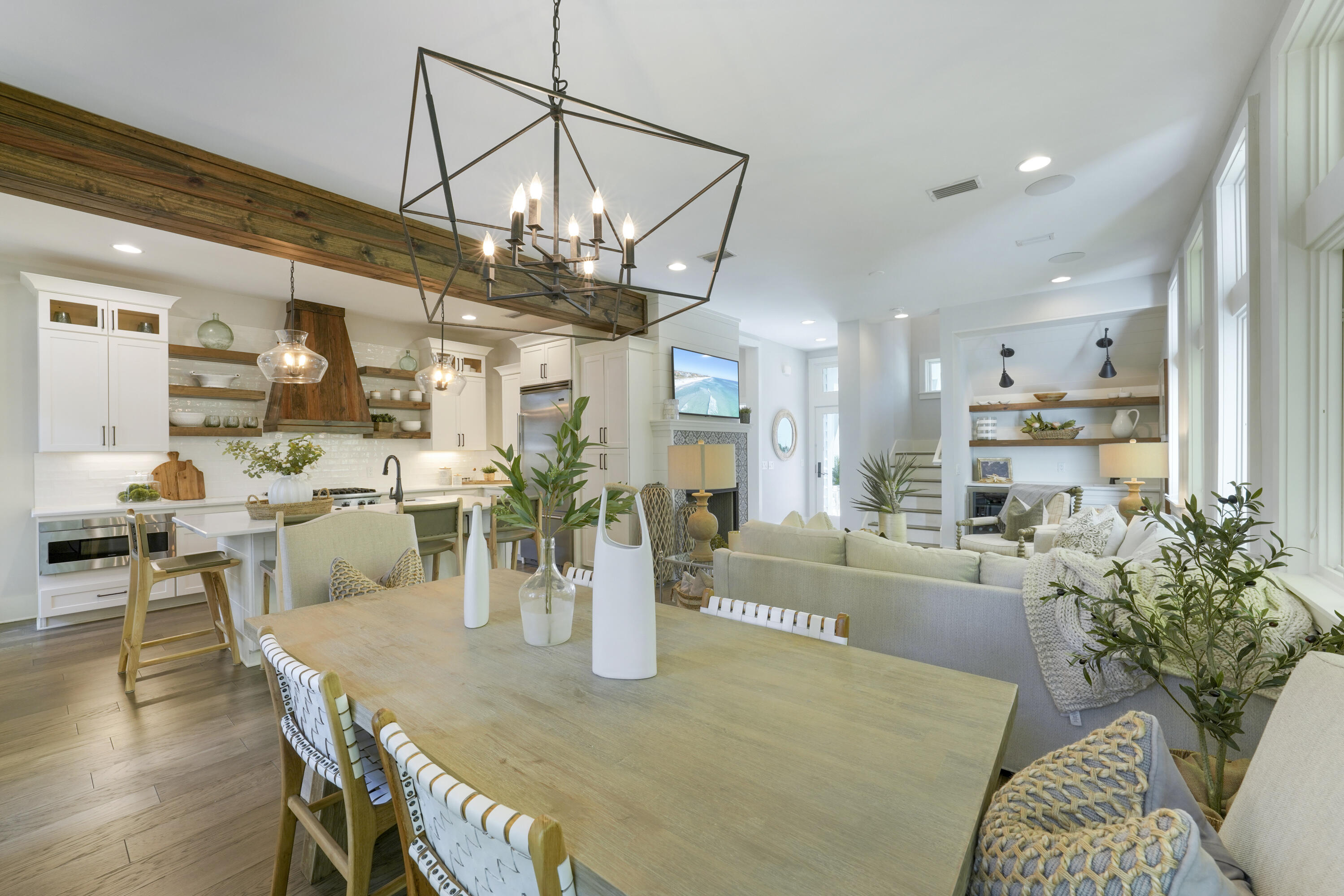 18 Bourne Lane Inlet Beach, FL 32461 - Photo 15 of 81 a view of a dining room and livingroom with furniture wooden floor a chandelier
